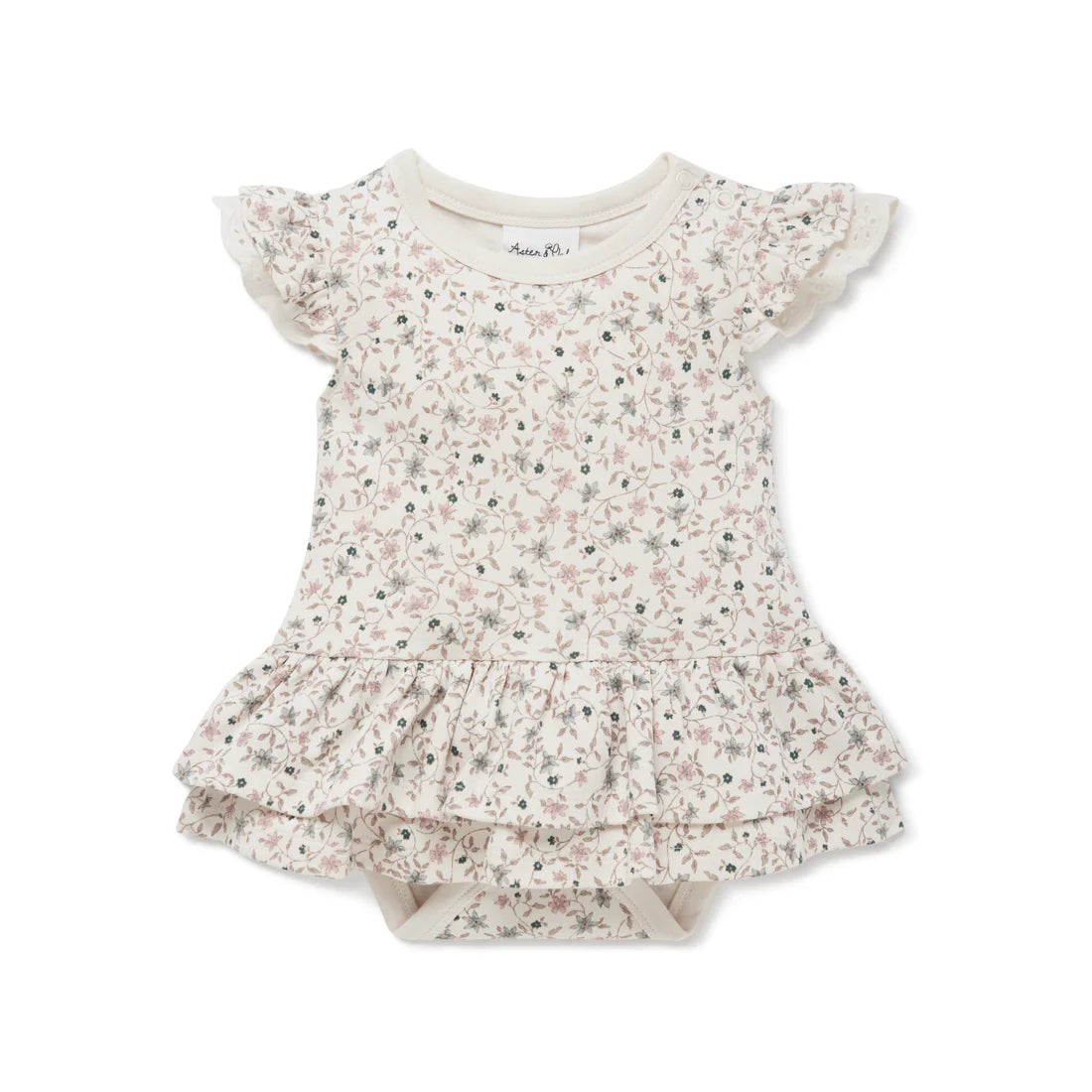 This winter floral onesie features long sleeves with flutter and lace detail over the shoulder, all over floral design with snap buttons to the neckline and bottom. A pretty design of tiny flowers and leaves in pastel pinks and blues…