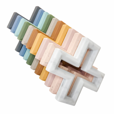 Swiss cross silicone teether comes in a range of colours and helps soothe baby's sore gums